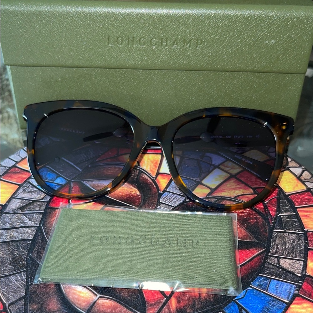 Longchamp Brown Sunglasses. SOLD